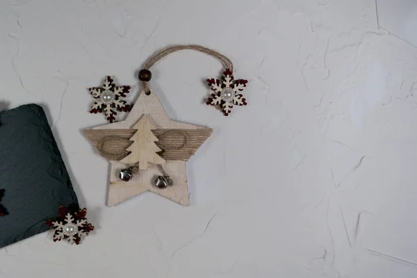Wooden Christmas Decorations Gray Background Snowflakes — Zdjęcie stockowe