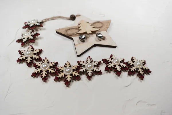 Wooden Christmas Decorations Gray Background Snowflakes — Zdjęcie stockowe