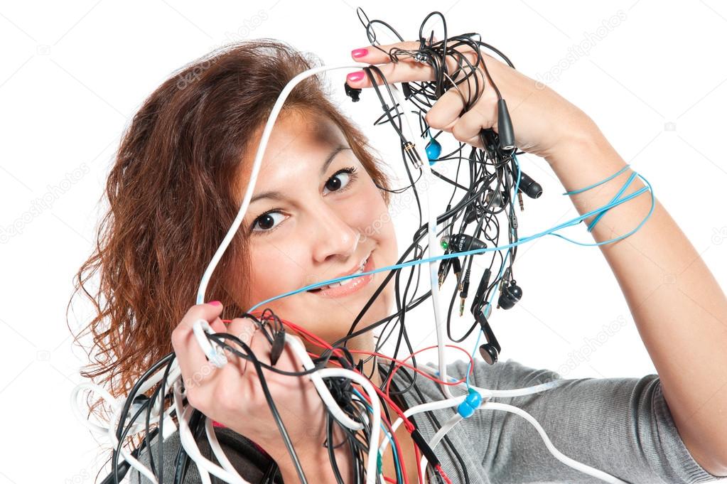 A young woman with the bunch of wires
