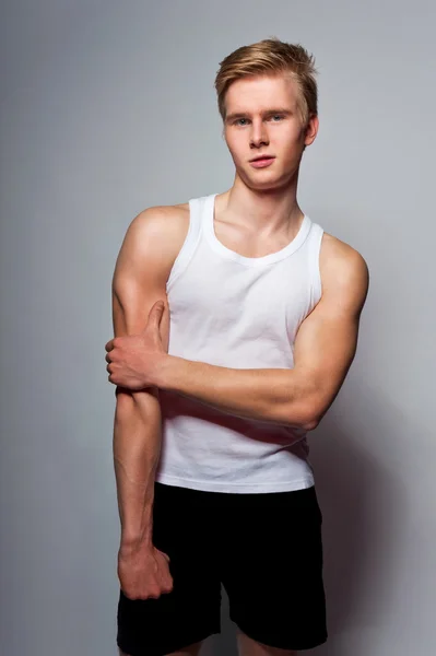 Young handsome blond man wearing t-shirt — Stock Photo, Image