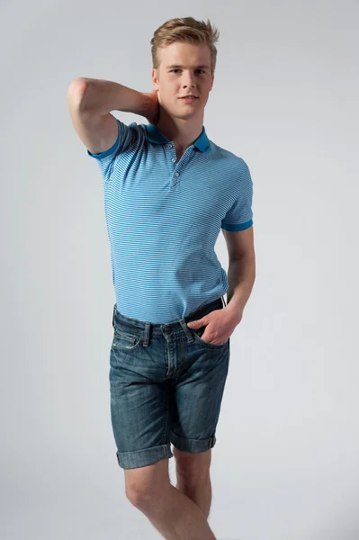 Young blond man in blue shirt — Stock Photo, Image