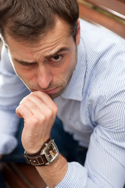 Man relaxing in the public garden — Stock Photo, Image