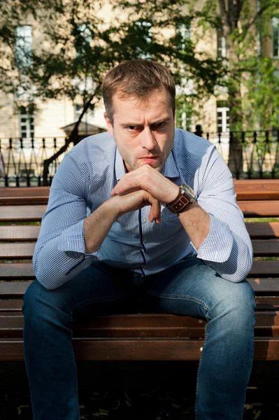 Man relaxing in the public garden — Stock Photo, Image