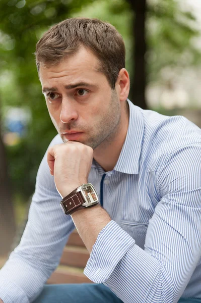 Man relaxing in the public garden — Stock Photo, Image