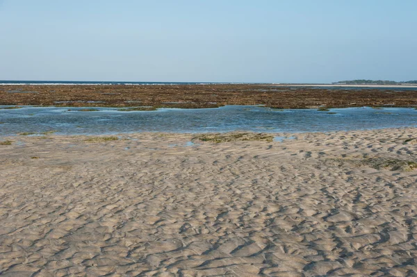 Yellow sand of the beach with sea view — Stock Photo, Image