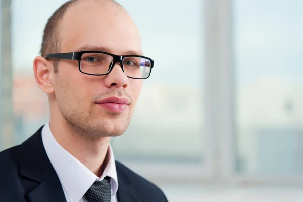 Business man wearing glasses in suit — Stock Photo, Image