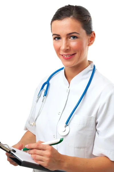 Médico feminino escrevendo na área de transferência — Fotografia de Stock