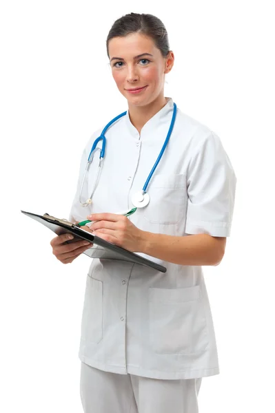 Doctor writing on clipboard Stock Image