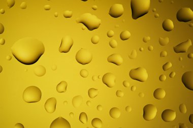 cam üzerine sarı altın su damlaları