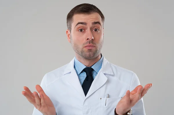 Doctor shrug with raised hands. — Stock Photo, Image