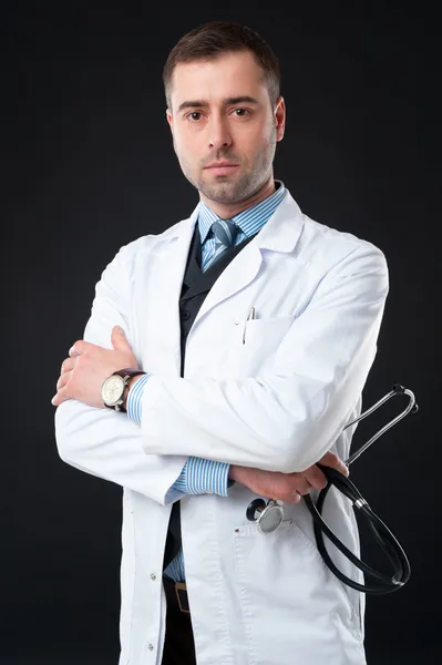 Arts houdt stethoscoop Rechtenvrije Stockafbeeldingen