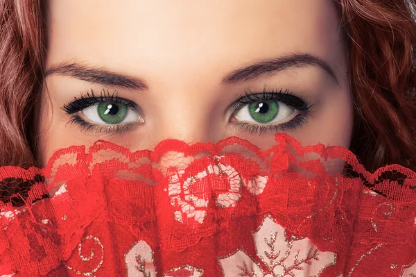 Olhos femininos e ventilador — Fotografia de Stock