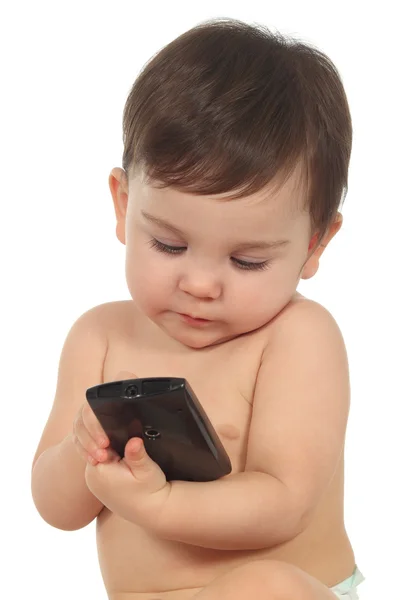 Bambino con un telefono cellulare — Foto Stock