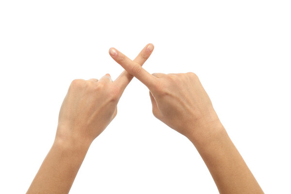 Женщины скрещивают пальцы
