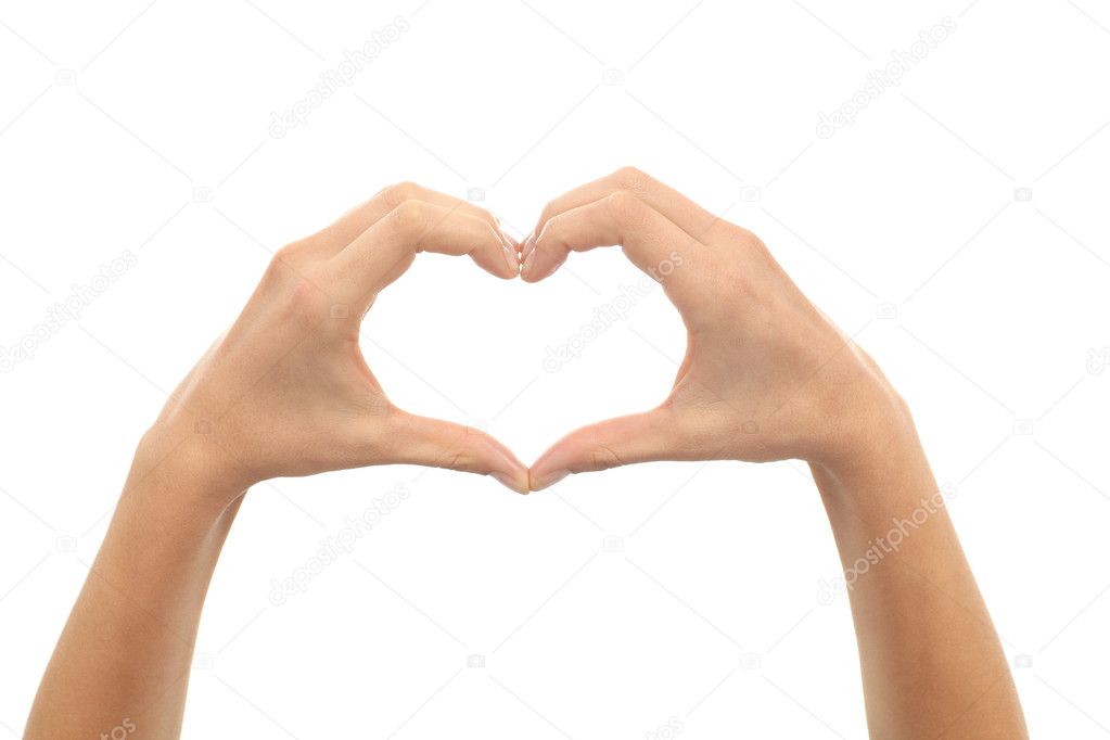 Woman hands making a heart shape