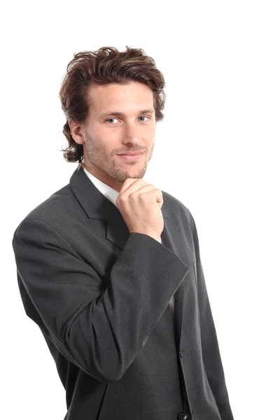 Business attractive young man with a hand on chin Stock Photo