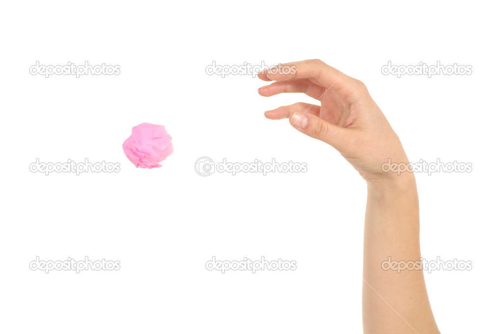 Woman hand throwing a paper
