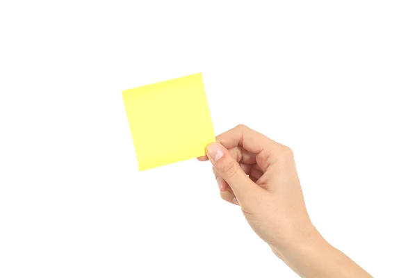 Kadın el sarı notepaper tutarak — Stok fotoğraf