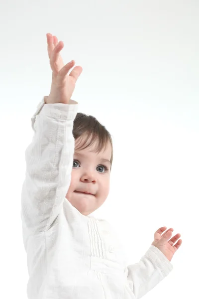 Baby met een hand omhoog — Stockfoto