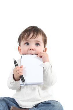 boş bir defter ısırma bebek