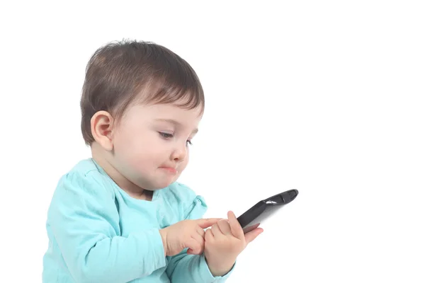 Bebé casual tocando un teléfono móvil — Foto de Stock