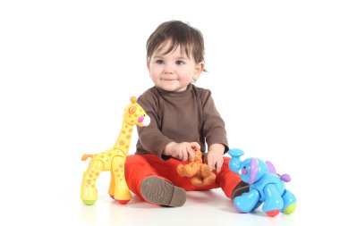 Baby playing with colorful toys clipart