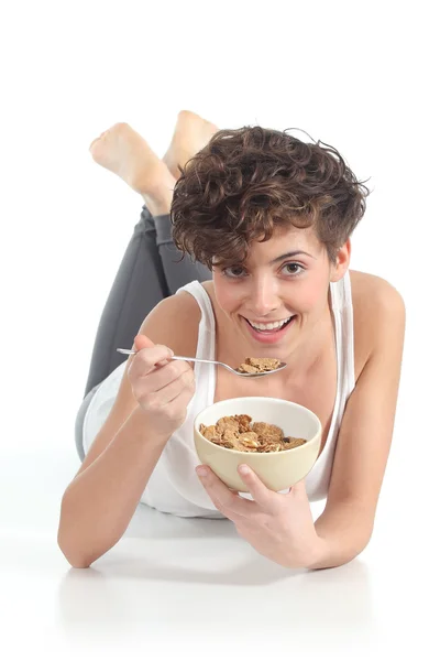 Beautiful woman eating corn flakes — Stock Photo, Image