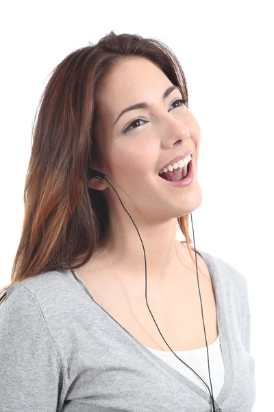 Hermosa adolescente cantando y escuchando la música con auriculares —  Fotos de Stock
