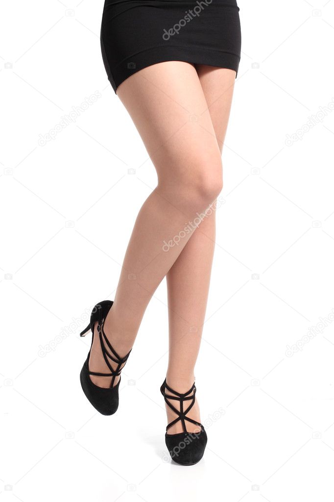 Front view of a beautiful long and sexy woman legs with heels and tights