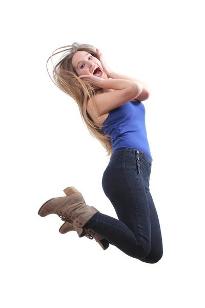 Blonde teenager jumping happy — Stock Photo, Image