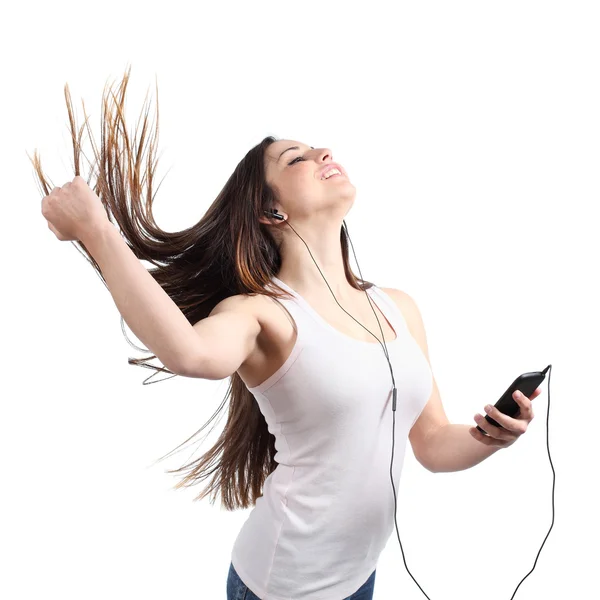 Beautiful woman dancing and listening to the music with headphones — Stock Photo, Image