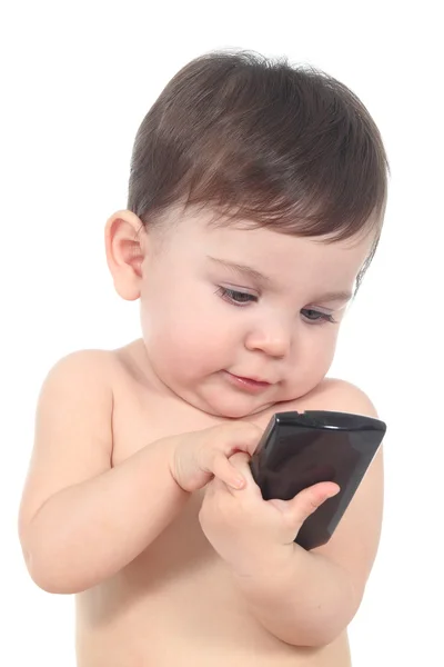 Младенец играл и прикасался к мобильному телефону — стоковое фото