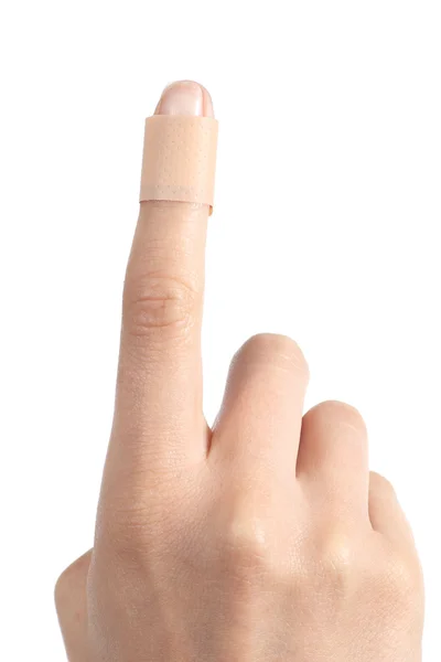 Forefinger of a woman hand with a band aid — Stock Photo, Image