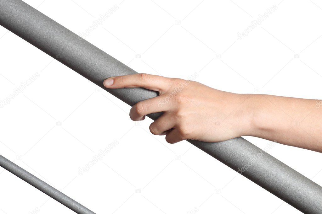 Woman hand resting on a railing