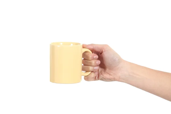 Vue latérale d'une main de femme tenant une tasse — Photo