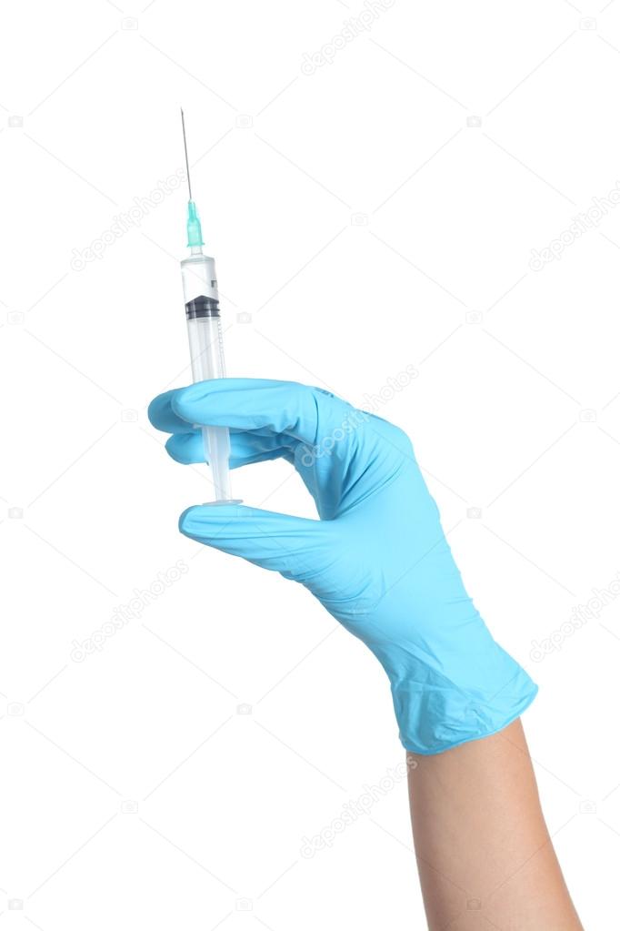 Woman hand with glove holding a syringe