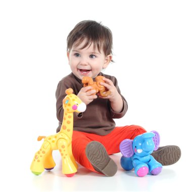 hayvan oyuncakları ile oynarken sevimli küçük kız bebek