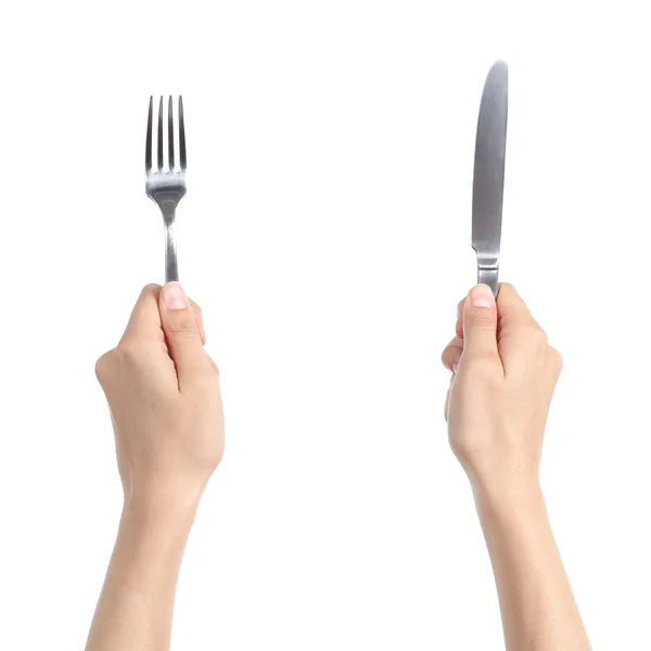 Woman hands holding a fork and a knife — Stock Photo, Image