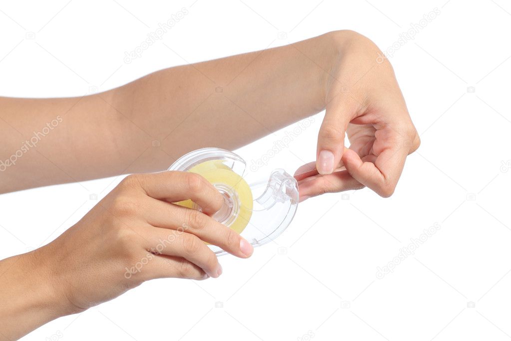 Woman hand holding and using adhesive tape