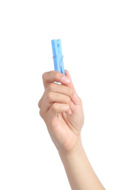 bir clothespin tutan bir kadın elinin Önden Görünüm