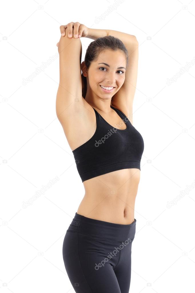 Beautiful fitness woman stretching isolated