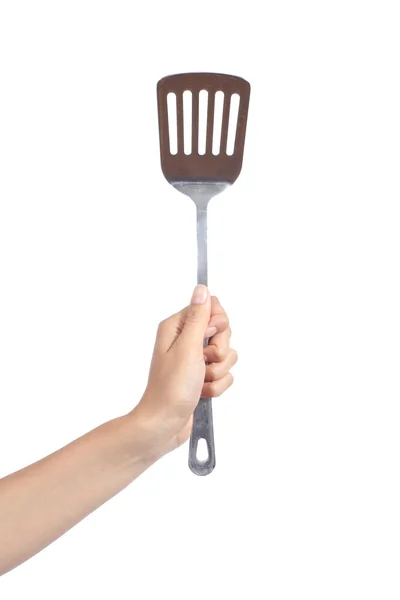 Woman hand holding a spatula — Stock Photo, Image