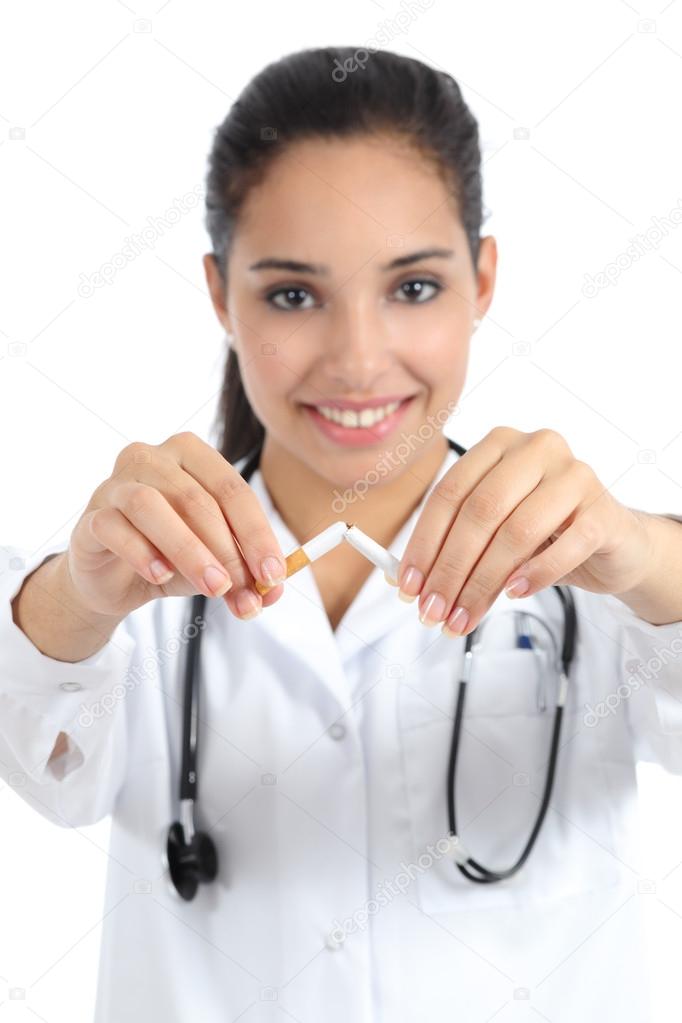 Female doctor breaking a cigarette