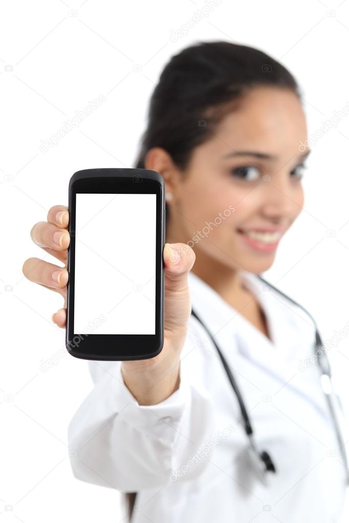 Beautiful female doctor showing a smart phone screen isolated