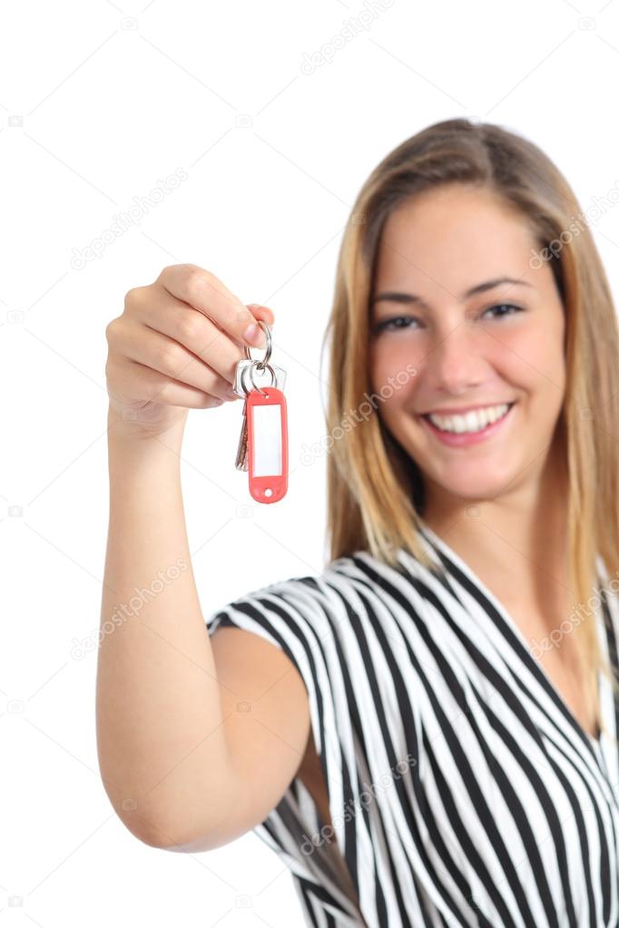 Elegant woman showing her new home keys