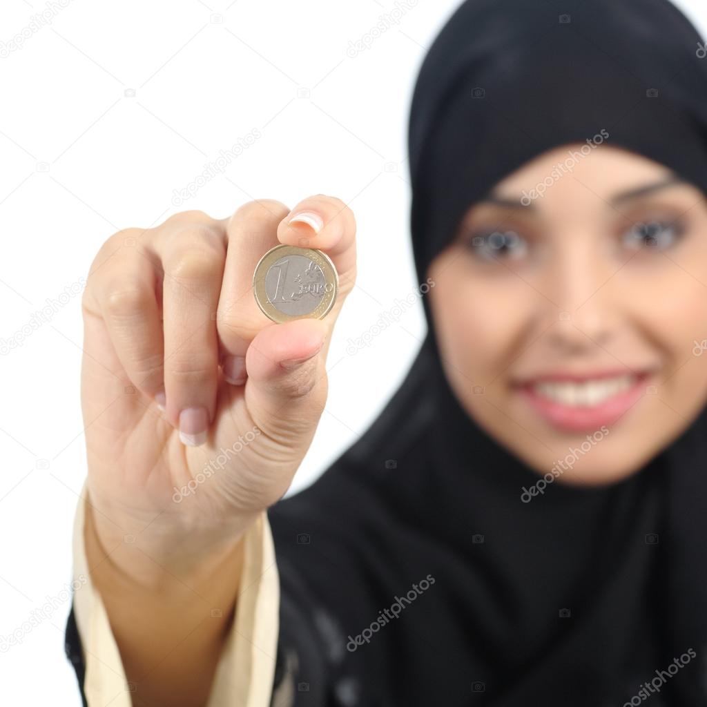 Arab woman holding and showing an euro coin