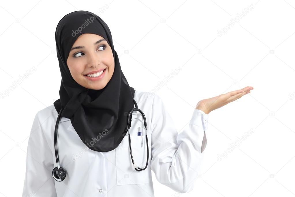 Arab doctor woman presenting with palm up