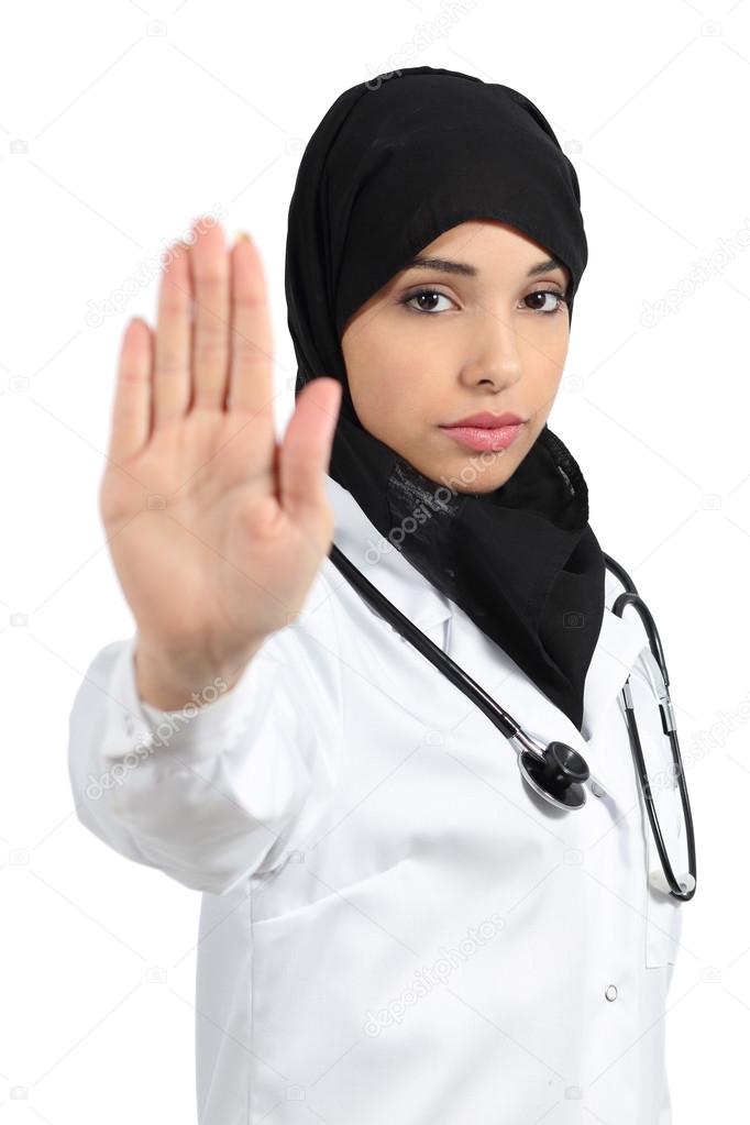 Arab female doctor making a hand stop gesture