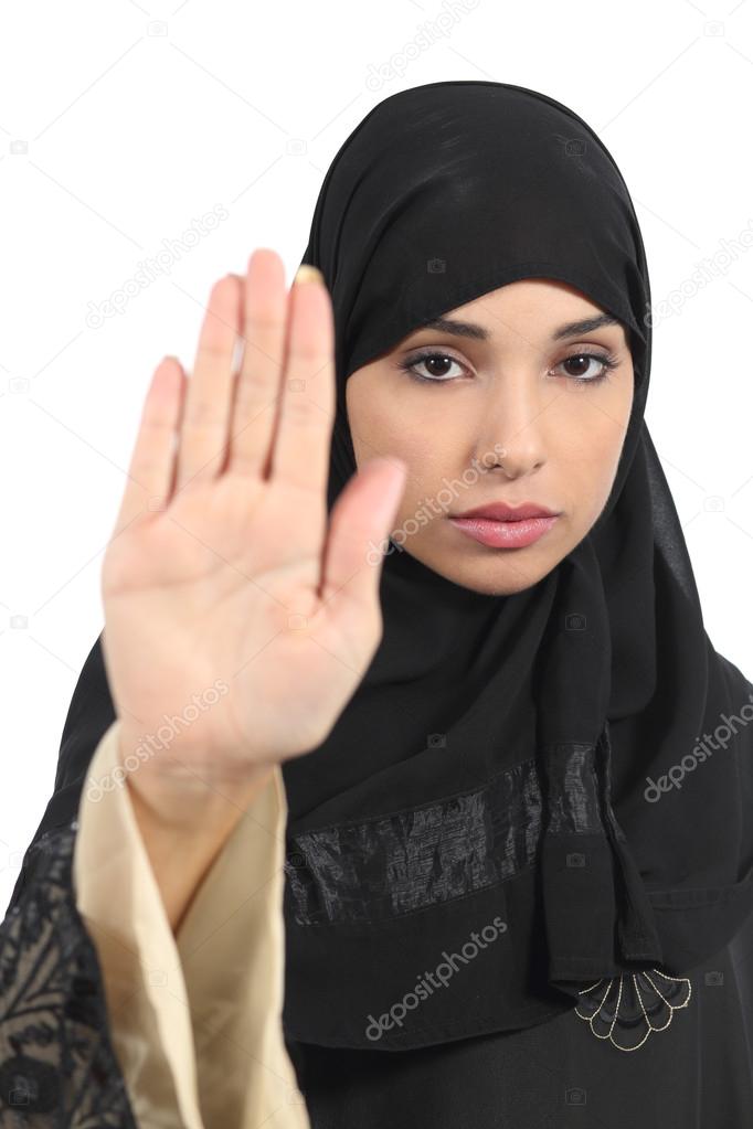 Arab woman making stop gesture with her hand