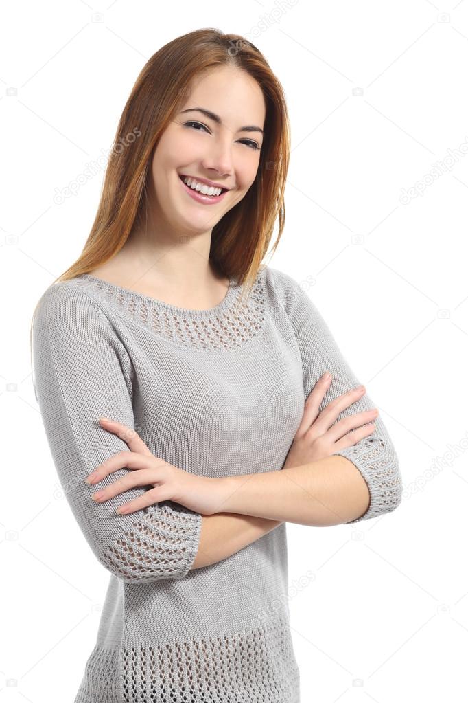 Confident woman with white smile standing with folded arms